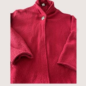 A People United Hand loomed sweater